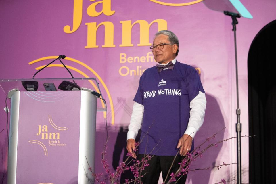 William T Fujioka wearing a JANM Scrub Nothing T-Shirt